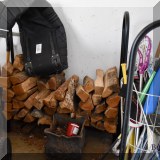 L03. Wood rack and firewood. 